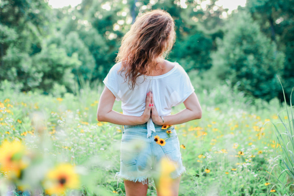 Charlotte yogi in a beautiful field