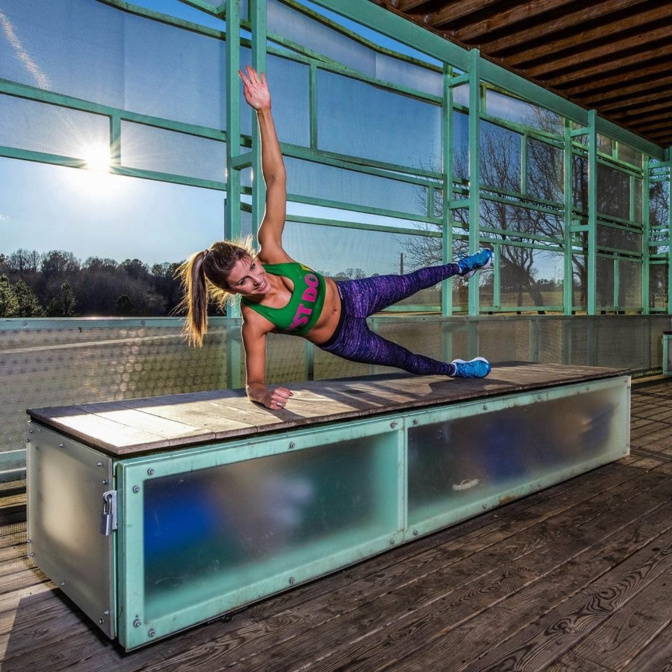 girl doing a side plank
